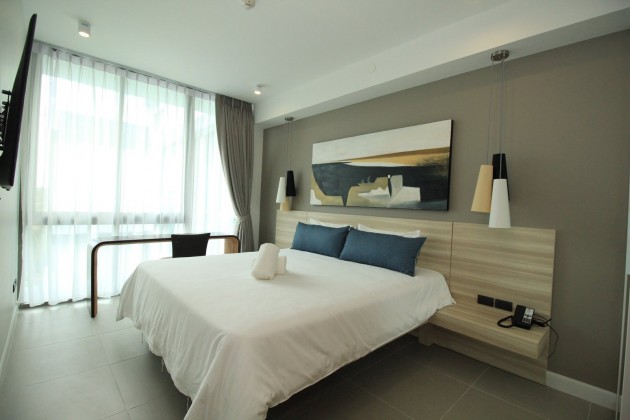 Beautiful top floor Condominium for sale walking distance to Beach Image by Phuket Realtor