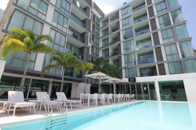 Beautiful top floor Condominium for sale walking distance to Beach Image by Phuket Realtor